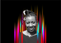 On the middle of a black background is a row of colourful vertical stripes’. In the centre is a black and white profile photo of TEDx speaker Donna Murray-Turner superimposed on top.