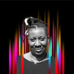 On the middle of a black background is a row of colourful vertical stripes’. In the centre is a black and white profile photo of TEDx speaker Donna Murray-Turner superimposed on top.