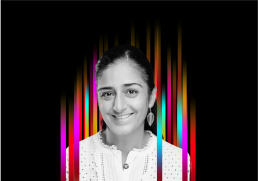 On the middle of a black background is a row of colourful vertical stripes’. In the centre is a black and white profile photo of TEDx speaker Ghino Parker superimposed on top.